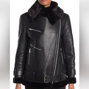 Walter Baker leather/fur, moto-jacket.  It’s very thick and very warm.